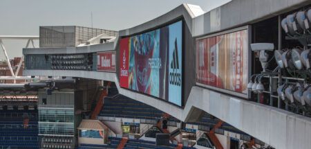 Can you identify this soccer stadium from its videoboard?